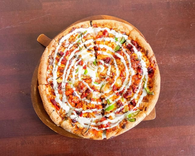 Halal Hut Pizza Chicken.