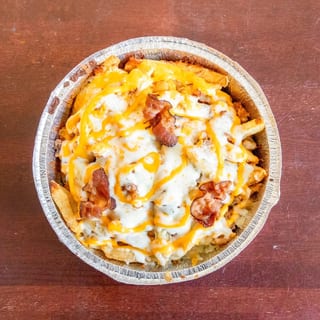 Sexy Fries lots of Queso & Bacon